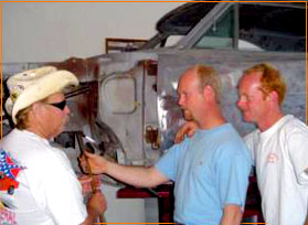 Rich Sephton passing the torch to Bob and James Smith